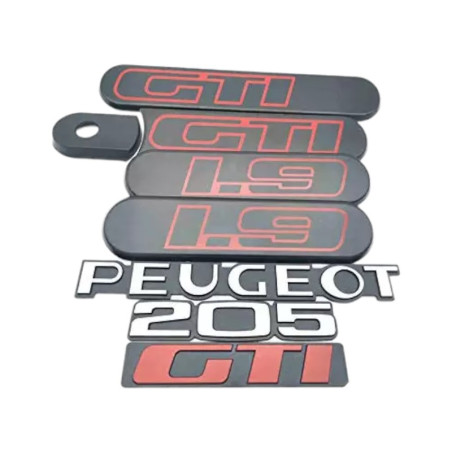 Grijze Peugeot 205 GTI 1.9 Custodes met Peugeot 205 GTI logo's